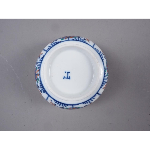 62 - A Chinese blue and white porcelain bowl with lotus flower, scroll and Greek key decoration, six-char... 