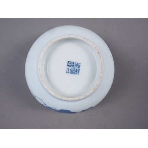 62 - A Chinese blue and white porcelain bowl with lotus flower, scroll and Greek key decoration, six-char... 