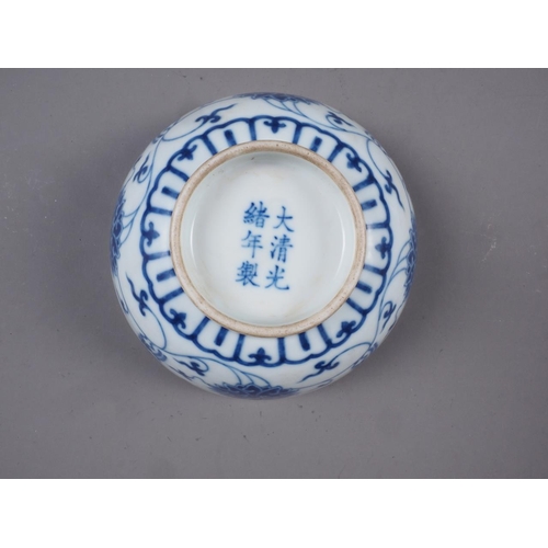 62 - A Chinese blue and white porcelain bowl with lotus flower, scroll and Greek key decoration, six-char... 