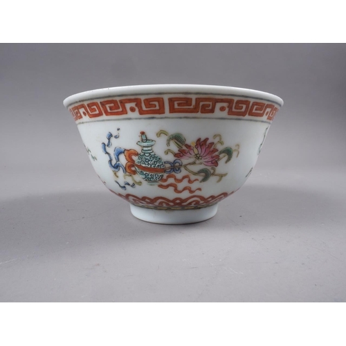 65 - A Chinese bowl with precious object decoration, seal mark to base, 4 1/2