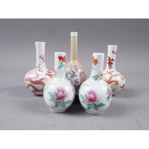 67 - A pair of Chinese sprinkler vases with dragon, flaming pearl and cloud decoration, four-character ma... 