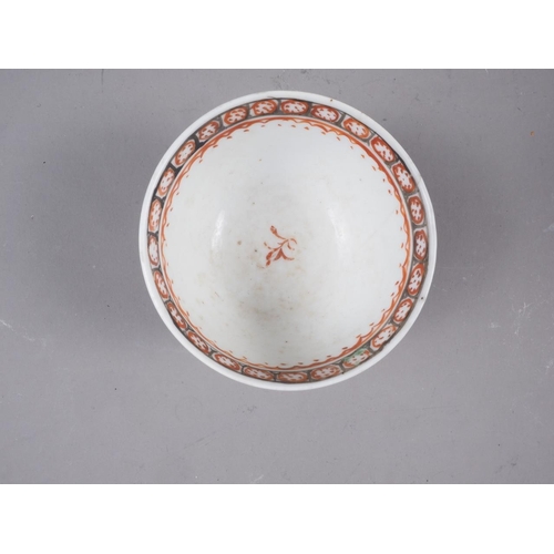 70 - A pair of Chinese pink glazed tea bowls with interior peach decoration, 2