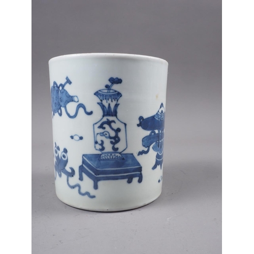 71 - A Chinese blue and white brush pot decorated precious objects, a pair of blue and white willow patte... 