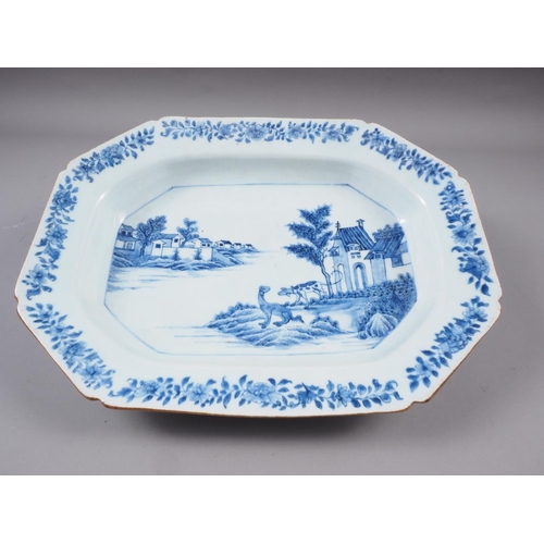 84 - A Chinese blue and white platter with animals in a landscape decoration and floral borders, 14 1/2