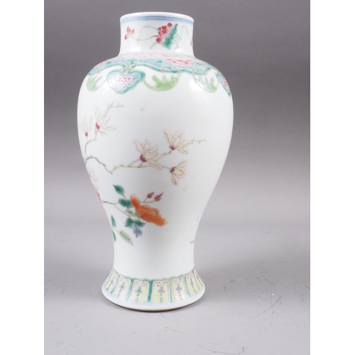 85 - A Chinese famille rose baluster vase with vase and flower decoration, ring mark to base, 8 1/4