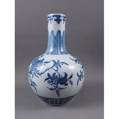 94 - A Chinese blue and white bulbous sprinkler vase with acanthus leaf, flora and fruit decoration with ... 