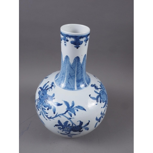 94 - A Chinese blue and white bulbous sprinkler vase with acanthus leaf, flora and fruit decoration with ... 