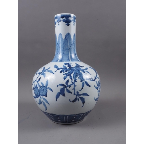 94 - A Chinese blue and white bulbous sprinkler vase with acanthus leaf, flora and fruit decoration with ... 