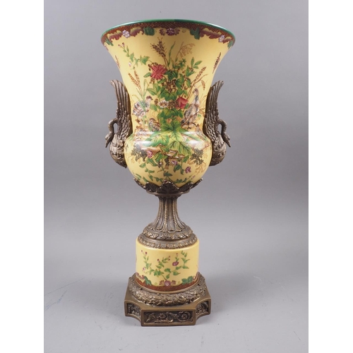 96 - A Chinese urn with gilt mounts and handles, formed as birds, and bird, foliage and flower decoration... 