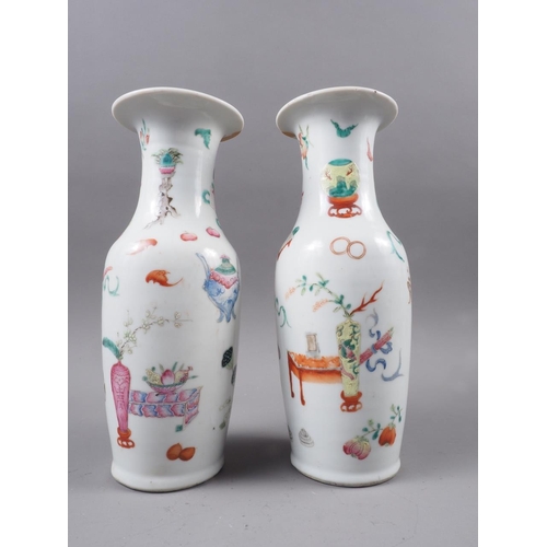 97 - A pair of 19th century Chinese baluster vases, decorated precious objects, 10