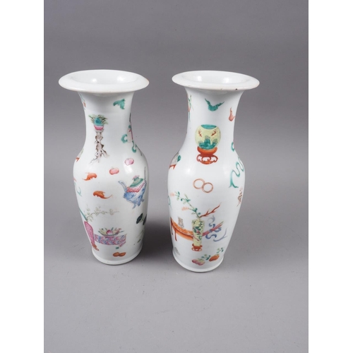 97 - A pair of 19th century Chinese baluster vases, decorated precious objects, 10