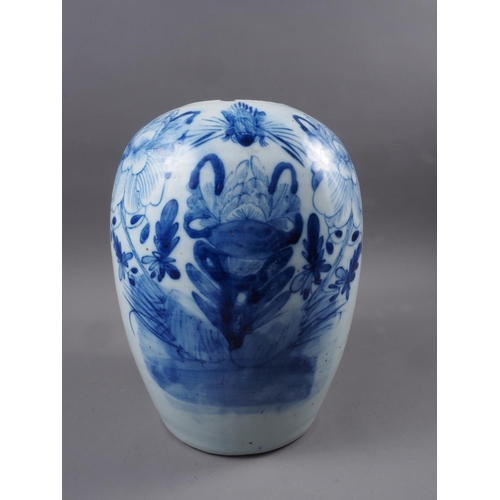 98 - A Chinese blue and white pottery baluster vase with floral decoration, 11