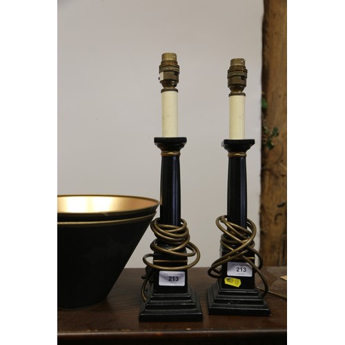 213 - A pair of ceramic and composition table lamps, formed as columns, on square stepped bases, 15 1/2