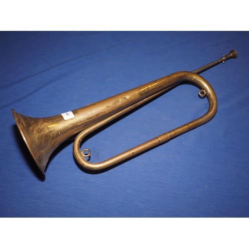 144 - A brass bugle, 23 1/2