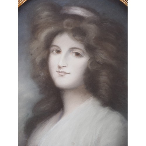 359 - A 18th century oval pastel portrait of a girl, sight size 21