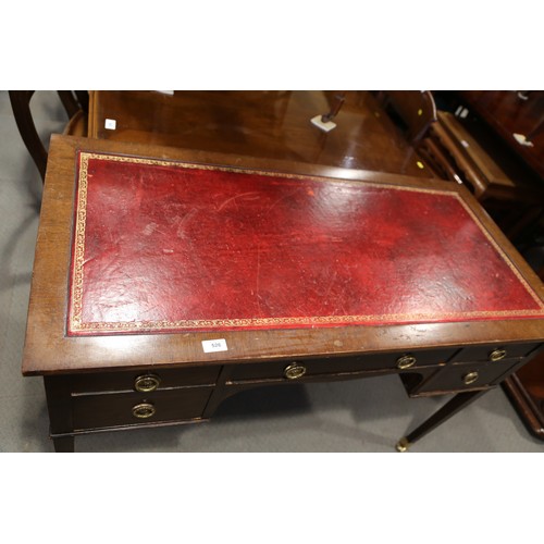 526 - An early 20th century mahogany writing desk, fitted tool lined top over five drawers, on square tape... 