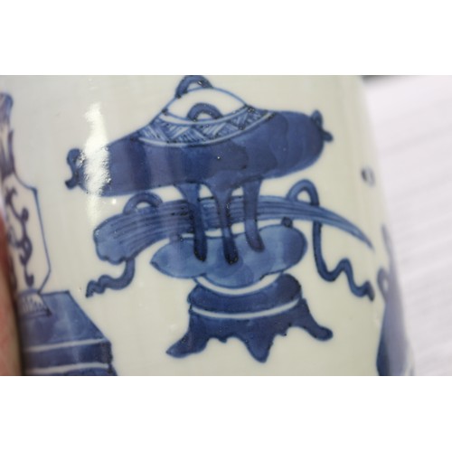 71 - A Chinese blue and white brush pot decorated precious objects, a pair of blue and white willow patte... 