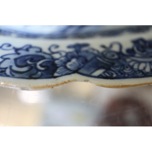 71 - A Chinese blue and white brush pot decorated precious objects, a pair of blue and white willow patte... 