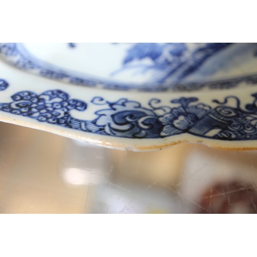 71 - A Chinese blue and white brush pot decorated precious objects, a pair of blue and white willow patte... 