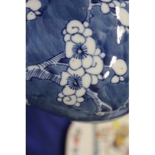 88 - A Chinese blue and white baluster vase and cover, decorated prunus, double ring mark to base, 14