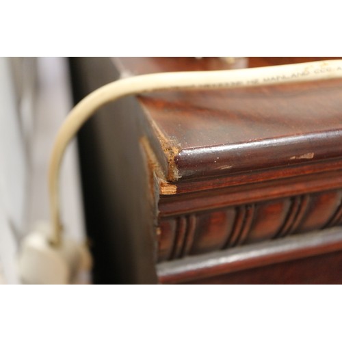 390 - A late 19th century mahogany open bookcase with ovolo cornice over three adjustable shelves, on bloc... 