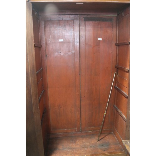 430 - A 19th century French walnut inverse breakfront wardrobe enclosed four panel doors, on turned suppor... 