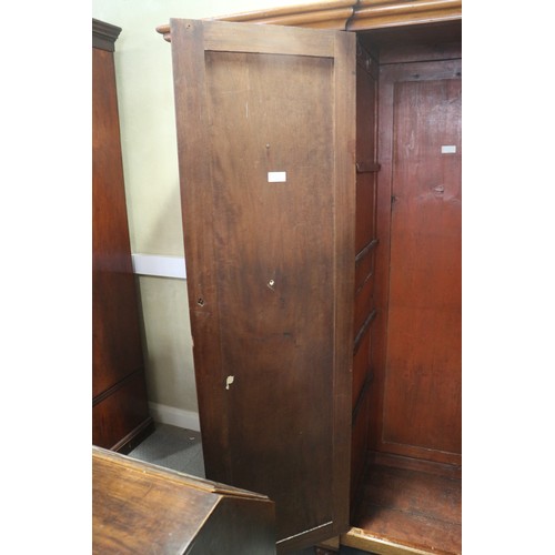 430 - A 19th century French walnut inverse breakfront wardrobe enclosed four panel doors, on turned suppor... 