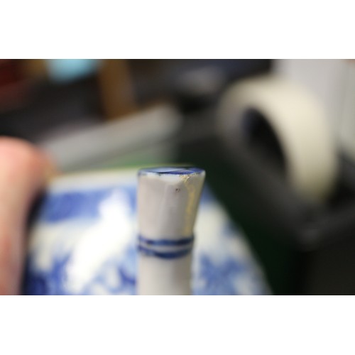 83 - A Chinese blue and white ovoid teapot with associated lid, dragon and cloud decoration, four-charact... 