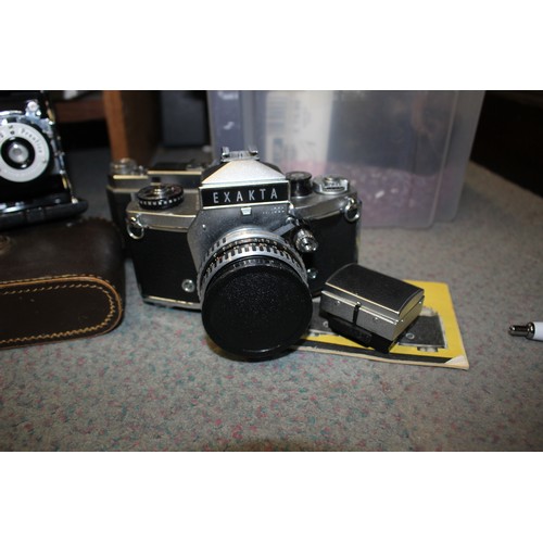 109 - An Exa Exakta camera, a Kodak Retina II camera and various other cameras and accessories