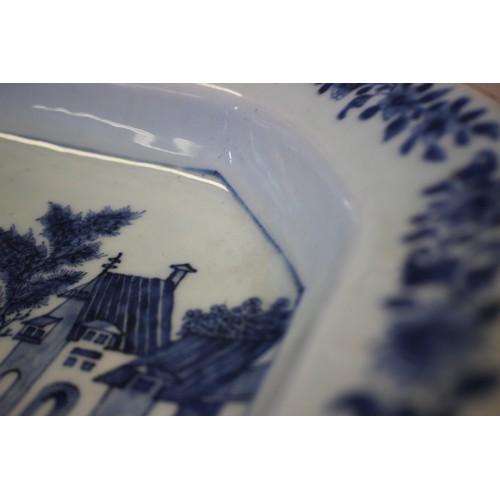 84 - A Chinese blue and white platter with animals in a landscape decoration and floral borders, 14 1/2