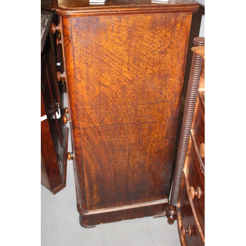 397 - A 19th century figured walnut chest of two short and three long drawers, on block base, 46