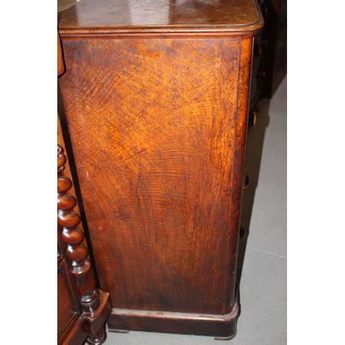 397 - A 19th century figured walnut chest of two short and three long drawers, on block base, 46