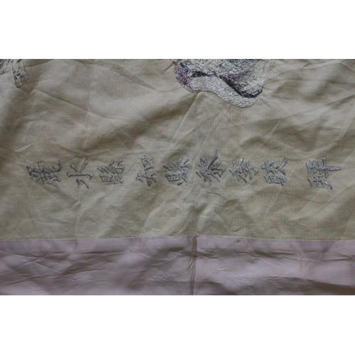 185 - A Chinese silk embroidery with bird, tree and verse designs, 62 1/4