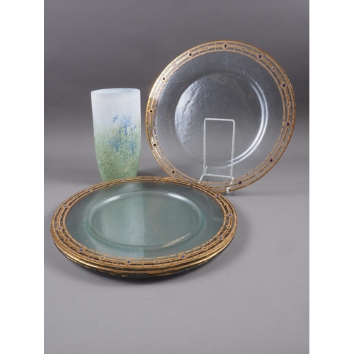 26 - A set of four gilt and enamel decorated glass platters, 14