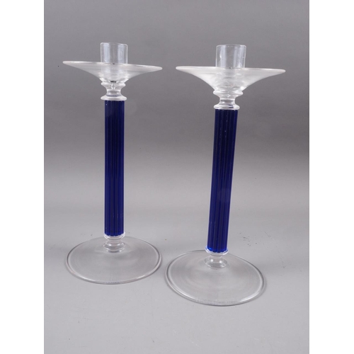 27 - A pair of Murano glass candlesticks with blue ribbed stems, 13