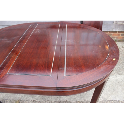 431 - A Chinese hardwood dining table, on square taper supports with three leaves, 96