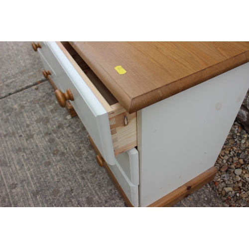 444 - A pair of John Lewis Hungerford painted pine and pine top three drawer bedside cupboards, 15