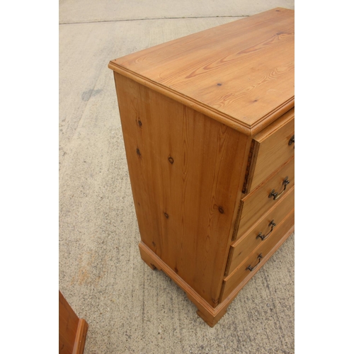 452 - A waxed pine chest of two short and three long drawers with brass bail handles, on bracket feet 36