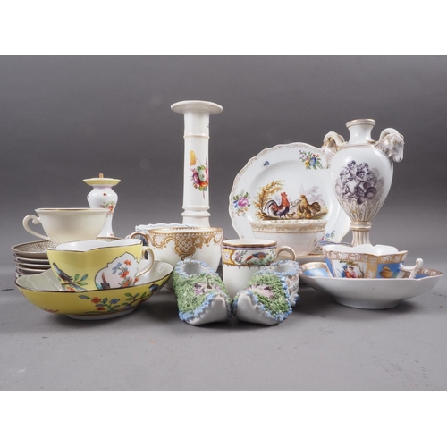 55 - A quantity of mostly Continental china, including a Meissen shaped cabinet plate with central cocker... 