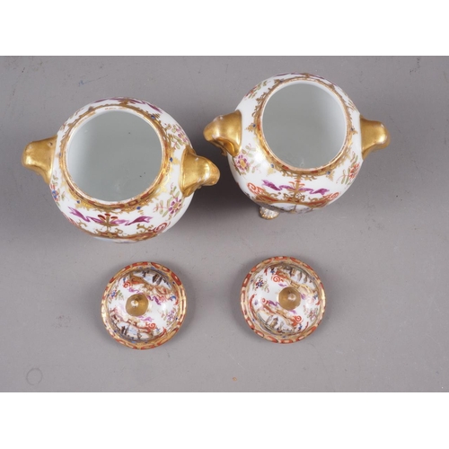 8 - A pair of 19th continental porcelain century two-handled jars and covers, decorated panels with boat... 