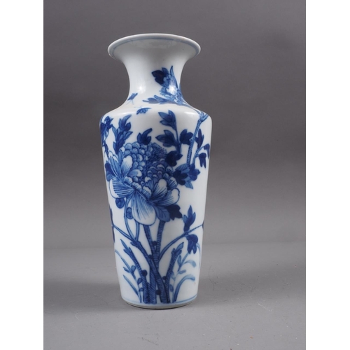 83 - A Chinese blue and white flared rim vase, decorated with two figures carrying an urn and birds and f... 