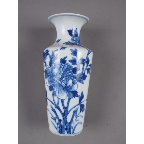 83 - A Chinese blue and white flared rim vase, decorated with two figures carrying an urn and birds and f... 