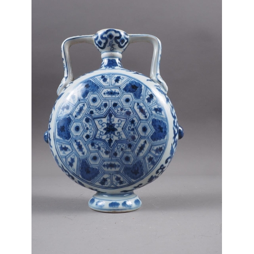 83 - A Chinese blue and white flared rim vase, decorated with two figures carrying an urn and birds and f... 