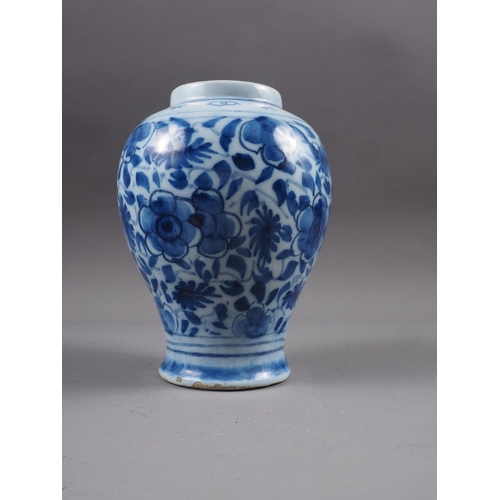 83 - A Chinese blue and white flared rim vase, decorated with two figures carrying an urn and birds and f... 