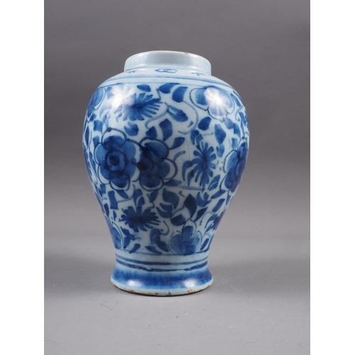 83 - A Chinese blue and white flared rim vase, decorated with two figures carrying an urn and birds and f... 