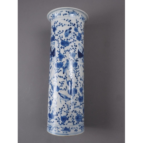 83 - A Chinese blue and white flared rim vase, decorated with two figures carrying an urn and birds and f... 