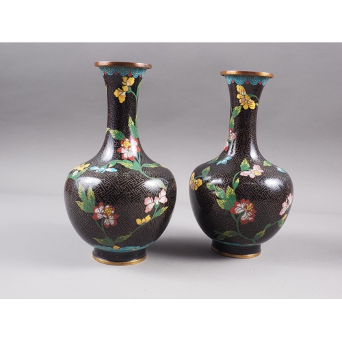 94 - A pair of Chinese cloisonne baluster vases with dragon, lotus flower and scroll decoration, 9 1/2