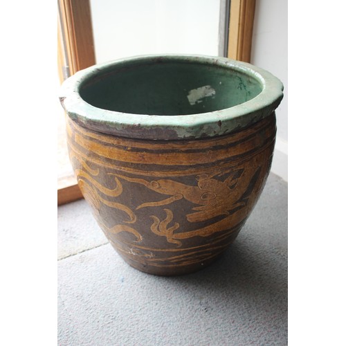 461 - A pottery slip decorated plant pot, 17