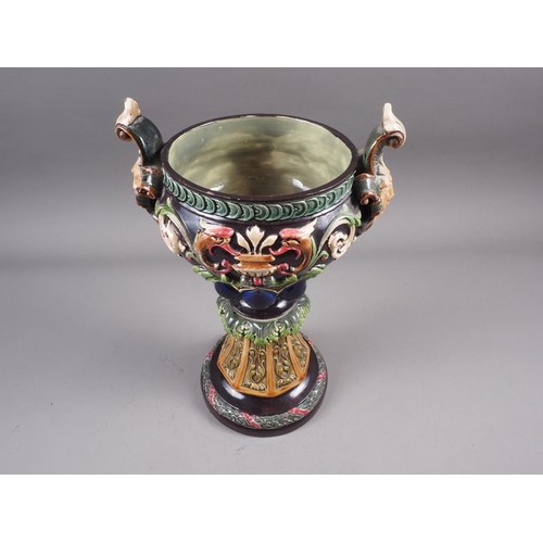 6 - A 19th century Continental Renaissance Revival two-handled vase with satyr masks and scroll decorati... 