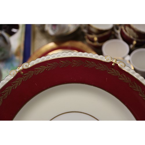 71 - A quantity of china, including a crimson and gilt decorated part combination service, a Dresden cup ... 